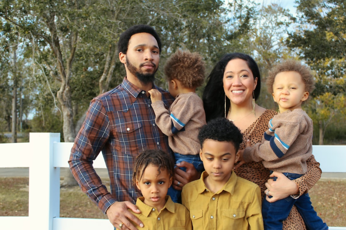 A Hispanic family embracing